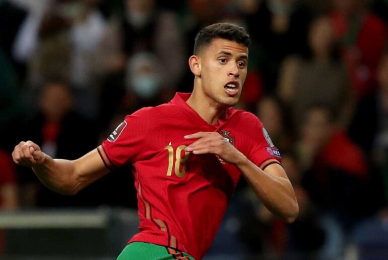 Matheus Nunes in the process of scoring for Portugal